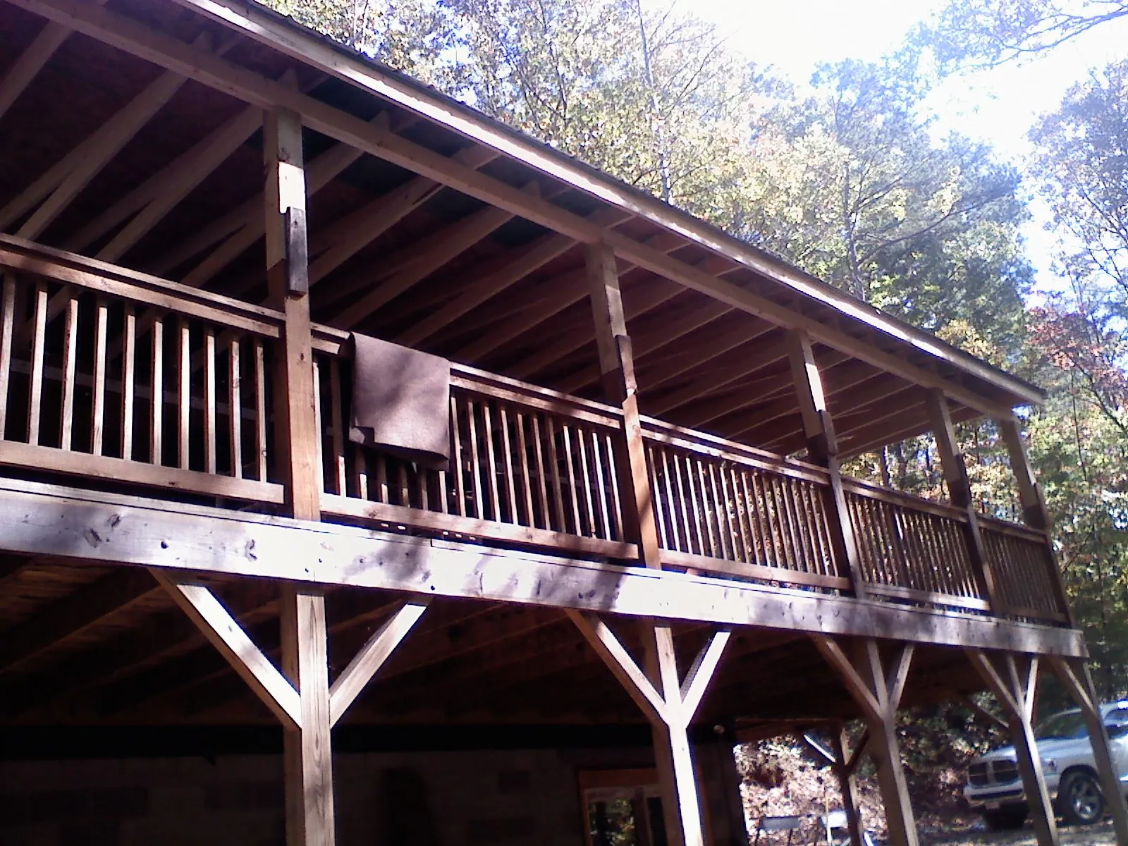 Timber framing under a new elevated porch and deck — Roof Leak Repair in Huntington by Roofing Brothers
